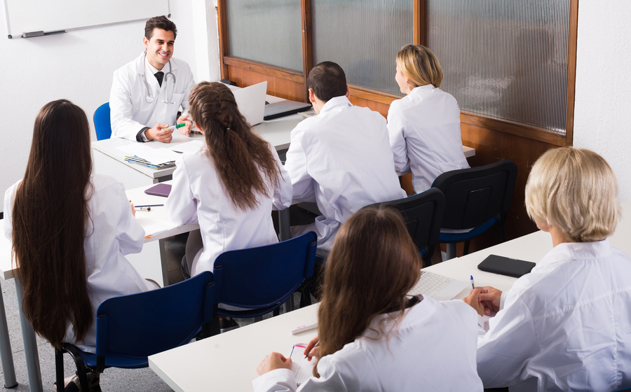 Health-care workers during educational program in school